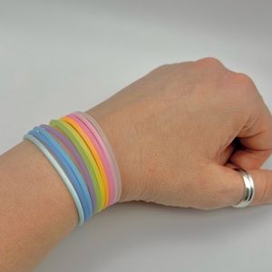 NEW 80s Silicone Rubber Bracelets Pack of 10 Pastel Colored Glow Bands